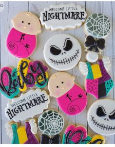 decorated sugar cookies with the words welcome to nightmare and jack - o'- lanterns