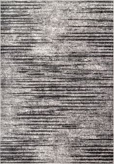 a black and white rug with horizontal lines on the bottom, in an abstract manner