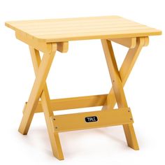 a small wooden table with a black tag on the top and two legs that are attached to it