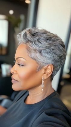 Embrace the stylish charm of the Elegant Gray Pixie Cut. This chic hairstyle offers a fresh, easy-to-maintain look, designed to complement your natural beauty. Click this pin and follow us for more hairstyle ideas. #PixieCut #GrayHair #BlackBeauty #StylishSeniors #HairInspo Pixie Haircut Older Women, Short Silver Hair Pixie Cuts Older Women, Pin Curls For Short Hair, Silver Couture, Grey Hair Braids, Gray Pixie, Cricut Blades, Chic Hairstyle