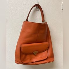 Nwt Banana Republic Orange Ebbed Leather Hobo Shoulder Bag. Front Exterior Fastened Picket With Gold Hardware. Interior Has Two Open Pouches And One Wid Zippered Pocket. Lining Is Burgundy. 13x12.5x6 Bucket Hobo Bag With Removable Pouch For Errands, Casual Satchel With Removable Pouch For Errands, Orange Bucket Bag With Large Capacity For Everyday Use, Orange Bags For Daily Use, Orange Large Capacity Bucket Bag For Everyday Use, Casual Hobo Bag With Detachable Handle For Errands, Casual Satchel With Detachable Handle For Errands, Casual Bags With Detachable Strap For Errands, Everyday Orange Bag