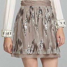 Antonio Melani Della Skirt Size 8 Nwt In Winter Sea Mist. Base Fabric 100% Nylon. Embroidery 68% Polyester/32% Metallic. Organza 100% Polyester. Lining 95% Polyester/5% Spandex. Side Zipper With Hook Eye Closure. Measurements: Waist - 28", Hip - 37", Length From Waist To Hem - 20". Silver Spring Skirt, Silver Skirt For Spring, Silver Sequined Holiday Skirt, Silver Sequined Skirt For Holidays, Silver Sequin Skirt For The Holidays, Silver Party Skirt With Lining, Holiday Silver Sequined Skirt, Silver Lined Party Skirt, Silver Mini Skirt With Sequins