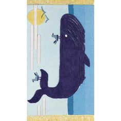 a rug with an image of a whale on it