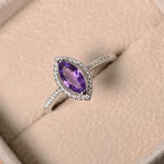 Purple amethyst ring marquise cut engagement silver by LuoJewelry Classic Marquise Amethyst Ring For Anniversary, Classic Marquise Amethyst Anniversary Ring, Marquise Amethyst Wedding Ring With Center Stone, Elegant Marquise Cut Amethyst Ring For Anniversary, Marquise Amethyst Ring With Prong Setting For Anniversary, Elegant Marquise Cut Amethyst Anniversary Ring, Marquise Amethyst Ring With Accent Stones For Gift, Elegant Amethyst Marquise Cut Ring For Anniversary, Marquise Amethyst Ring With Center Stone As Gift