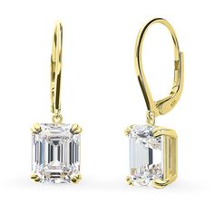 These solitaire dangle earrings are the very definition of good taste, featuring lustrous emerald-cut stones. The emerald cut is state of the art yet minimalistic. Often showcased on the red carpet, it emits radiance from every angle. If you appreciate sophistication, this one is for you. Crafted with sterling silver, yellow gold flashed, stamped 925. Set with premium quality 7.6 carat total (3.8 carat per stone, 10mm x 8mm) emerald cut cubic zirconia in 4-prong setting. Earrings measure 1" in l Grade 7, Leverback Earrings, Diamond Drops, Inspired Jewelry, Emerald Cut Diamonds, Pinky Ring, Gemstone Engagement Rings, Accessories Jewelry Earrings, Polish Jewelry