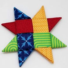 an origami star made out of fabric