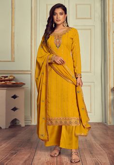 Yellow faux georgette kameez with palazzo 3102  Desc:  Style : Pakistani Salwar Kameez Color : Yellow Fabric : Faux Georgette Work : Embroidery Wash Care : Dry clean Sleeve Style : Full Sleeve Long Sleeves : Done only in Custom Stitch Sleeves Lining : Done only in Custom Stitch Bust Size : 32 to 42 Inches Occasion : Wedding   Diwali   Eid   Mehendi   Sangeet   Reception   Ceremonial   Engagement. With Express Free Shipping and Custom Stitching, Buy Eid Special Sharara Party wedding wear anarkali Luxury Yellow Georgette Churidar, Luxury Yellow Salwar Kameez With Zari Work, Luxury Yellow Anarkali Palazzo Set, Luxury Yellow Salwar Kameez With Dabka Detailing, Yellow Dupatta For Diwali, Luxury Yellow Maxi Length Salwar Kameez, Luxury Yellow Dress For Eid, Luxury Yellow Churidar With Pallu, Luxury Yellow Embellished Salwar Kameez