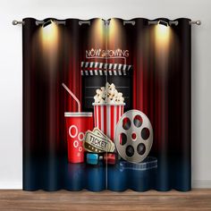 an image of a movie scene with popcorn, soda and film reel on stage curtains