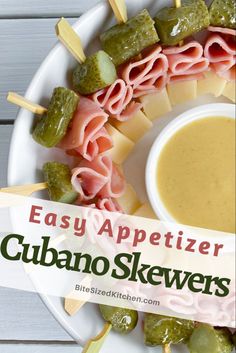 an appetizer plate with several different types of skewers on it and the title overlay reads easy appetizer cuban skewers