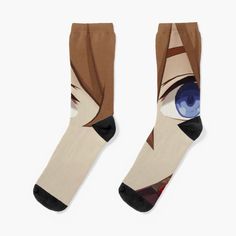 two pairs of socks with anime characters on them, one has blue eyes and the other has brown hair