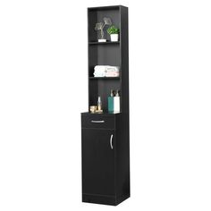 a tall black cabinet with two shelves and towels on it's sides, against a white background