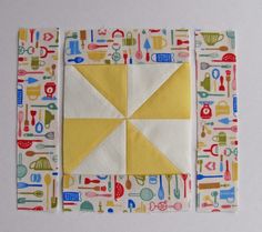 two pieces of quilted fabric with yellow and white squares in the middle, on top of each other