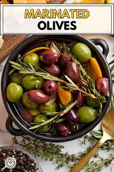 an image of olives in a pot with herbs and spices on the side text reads marinated olives