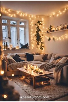 a living room filled with lots of furniture and christmas lights hanging from the wall above it