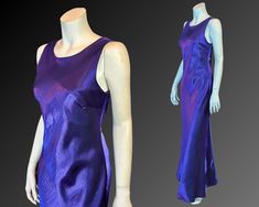 VINTAGE 90's PURPLE SATIN SLIP DRESS Tank style bias cut Slip Dress with Open Back. Plunge Back ends with two fabric ties allowing for a somewhat adjustable fit. Dark Purple Liquid Satin shimmers beautifully when you move. BY: Tag removed FABRIC: Satin SIZE: XS/S. See measurements to determine and confirm Fit. CONDITION: Excellent  MEASUREMENTS Shoulders 15" Bust 36"  Waist 31" Hips 38" Length 60" SHIPPING Canada: shipping listed is for Expedited Mail. Tracking and insurance included, up to 10 business days for delivery. USA: shipping listed is for Air shipping with Tracking & Insurance. Up to 10 business days for delivery. INTERNATIONAL: Shipping is for  Air Mail, Insured to $100. Returns not accepted for reasons of fit, only for missed damage. Please read the description and measurements Purple Satin Slip Dress, Purple Liquid, Liquid Satin, Iridescent Purple, Open Back Tank, Tank Maxi Dress, Dress With Open Back, Purple Satin, Maxi Tank Dress