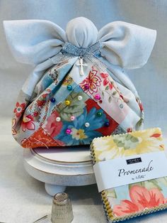 a small purse sitting on top of a white table