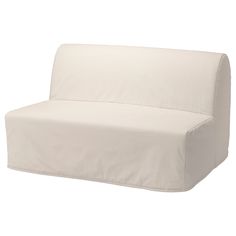 a white couch sitting on top of a white floor