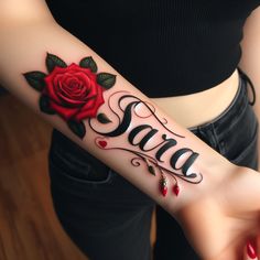 a woman's arm with a rose and the word sara tattooed on her wrist