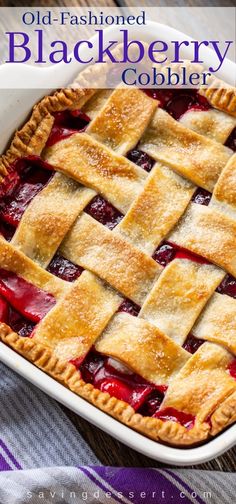 an old fashioned blackberry cobbler in a white dish