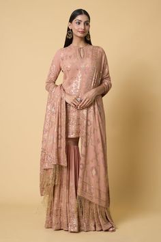 Kadambari pink short kurta with floral pattern sequin embroidery. Comes with coordinating gharara and dupatta. - Aza Fashions Pink Georgette Palazzo Set With Sheer Dupatta, Pink Georgette Sharara With Sheer Dupatta, Pink Chinon Sharara With Dabka Work, Pink Sharara With Mirror Work For Reception, Pink Mirror Work Sharara For Reception, Pink Chinon Sharara For Reception, Pink Chinon Sharara For Wedding, Pink Georgette Palazzo Set With Mirror Work, Pink Chikankari Embroidery Sharara For Festive Occasions