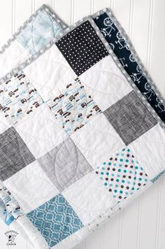 two quilts that are on top of each other