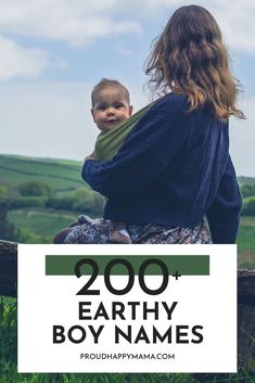 a woman holding a baby in her arms with the words 200 earthy boy names