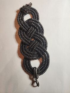 This is for a vintage, chunky, wide, black, multi strand, chain link bracelet. It is unsigned with no markings. It has a nice weight, and in good condition. This has not been cleaned or altered, because when I clean items sometimes they get more damaged. The color could be a little off in the photos. I took several pictures so you could see clearly the condition this is in. This is a used item and sold as is. If you have any questions, please contact me. I sell an item as is, so normally don't r Handmade Metal Braided Bracelets In Black, Handmade Black Metal Braided Bracelets, Pueblo Pottery, Strand Braid, Costume Jewelry Necklaces, Pretty Bracelets, Hat Pins, Braided Bracelets, Multi Strand