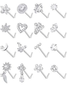 several different types of piercings are shown in black and white, with diamonds on them