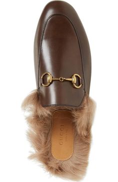 Click to zoom Gucci Luxury Round Toe Mules, Luxury Gucci Mules With Round Toe, Classic Gucci Mules With Leather Sole, Gucci Classic Mules With Leather Sole, Luxury Gucci Slip-on Mules, Gucci Slip-on Mules With Leather Sole, Chic Gucci Mules With Horsebit Detail, Gucci Calf Leather Mules With Leather Sole, Gucci Leather Slip-on Mules