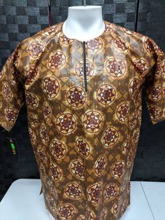 Dashiki with embroidery for men . One size fits all. Please tell us your size in the notes sectionat checkout if you want it altered to a fitting size. Traditional Brown Printed Top, Embroidery For Men, Dashiki For Men, Mens Dress Shirts, African Dashiki, African Men, Mens Dress, Charlotte Nc, Mens Shirt Dress