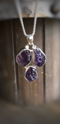 "Gorgeous Natural Rough Amethyst pendant handcrafted in 925 solid sterling silver with sterling silver popcorn chain. The total pendant weight is 9.03 g, and the length is about 1.6\"(including the bail). ✓You'll receive your new pendant in the signature gift box ✓ Natural Rough Amethyst ✓Because of the natural crystal structure, natural gemstones could have some small visible scars and crackles. ✓ Solid 925 Sterling Silver (925 parts per 1000) ✓ 925 silver hallmarked ✓ Every natural stone is di Silver Amethyst Pendant Crystal Necklace, Raw Amethyst Necklace, Faceted Amethyst Pendant Crystal Necklace, Purple Amethyst Necklace With Large Pendant, Amethyst Raw Stone Pendant Necklace, Matrix Opal, Crystal Structure, Raw Amethyst, Amethyst Pendant