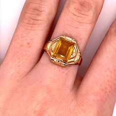 Vintage 1940's 10k yellow gold yellow stone ring. The ring size is a loose 9, and can be resized. The height of the ring off of the finger is 3.9mm. The width of the band is 3.7mm, and tapers down to 2.8mm. Antique Emerald Ring In Stamped 14k Yellow Gold, Antique Gold Jewelry With Center Stone, Antique Engraved Yellow Gold Ring With Gemstone, Victorian Gold Signet Ring With Gemstone, Vintage 14k Gold Sapphire Birthstone Ring, Gold Oval Sapphire Ring In Art Deco Style, Gold Topaz Ring With 17 Jewels In 14k Gold, Vintage Signet Ring With Birthstone For Promise, Gold Emerald Ring With Center Stone In 14k Gold