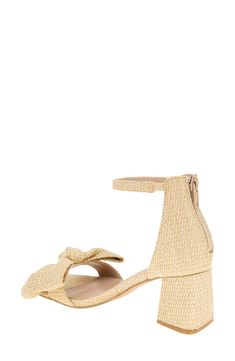 Woven raffia and a voluminous vamp bow lend visual intrigue to a stylish sandal balanced by a squared-off toe and wrapped block heel. 2 1/2" heel Back zip closure Memory foam cushioning Textile upper/synthetic lining and sole Imported Beige Open Toe Heels With Bow, Chic Straw Sandals With Ankle Strap, Square Toe Bow Sandals For Summer, Chic Straw Ankle Strap Sandals, Summer Bow Sandals With Square Toe, Chic Straw Open Toe Heels, Summer Bow Heels With Round Toe, Summer Heels With Bow And Square Toe, Chic Straw Sandals With Stacked Heel