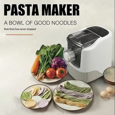 an advertisement for pasta maker with vegetables on plates