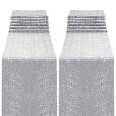 a stack of silver glittered boxes on top of each other