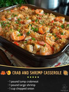 a casserole dish with shrimp and vegetables in it