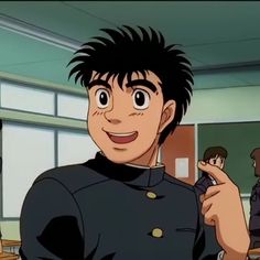 an anime character pointing at the camera with two other people in the background behind him