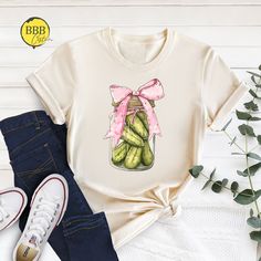 Pickle Coquette Shirt, Pickle Coquette Bows Shirt, Pickle Jars Shirt, Pink Bow Shirt, Pickle Lover Shirt, Funny Pickles Shirt, Coquette Gift Dear Customer, We're here to give you best Pickle shirt options for you. We want to make everyone smile with our cute , stylish and trendy graphic T-shirts. We can assure you this shirt will be perfect Pickle gift whether you will buy it yourself or for someone else. 1. Important Check size chart before you purchase 2. How to Order * Pick your shirt type an Sweet Summer Cotton Shirt, Sweet Cotton Summer Shirt, Sweet Cotton Tops As Gift, Sweet Summer Tops As Gift, Sweet Summer Tops For Gift, Sweet Cotton Shirt For Spring, Cute Summer Shirt As A Gift, Pickle Shirt, Pickle Gifts