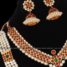 Design by Classical Dance Jewelry® ❥ Colorful And Designer Traditional Kemp Temple Indian Jewelry Set For Everyone ❥ Age : 11 and above ❥ You Can wear this set especially for Bharatnatyam And Kuchipudi Dance Performances and in Parties, Engagement, Weddings, Birthdays. ❥ Handmade fine quality Indian Item. ❥ Studded with imitation kempu stones and pearls. ❥ It's handmade item so they might not close exactly like the sample picture. Set includes ☛ Short Haram Necklace, 4 Line pendants Long pearl H Temple Necklace With Peacock Design For Festivals And Celebrations, Festive Peacock Design Sets, Traditional Sets With Peacock Design For Festivals, Traditional Festival Sets With Peacock Design, Festival Sets With Peacock Design, Temple Jewelry Sets For Festivals Celebration, Temple Indian, Dance Indian, Kuchipudi Dance