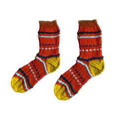 two pairs of red and yellow socks with blue stripes on the bottom one pair is worn by someone