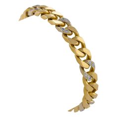 Made by Van Cleef & Arpels, Paris in the 1960s-1970s, this curb link bracelet is composed of 18K gold and diamonds. It is designed as a series of flattened 18K gold curb links highlighted at intervals by pairs of round brilliant-cut diamonds. This casually elegant and classic form, created in the period when jewelry lovers were rediscovering their love of gold, is beautifully flexible and nicely weighted for the wrist. PRODUCT DETAILS CURATOR'S NOTES Item #: BA-20099 Artist: Van Cleef & Arpels, New York Country: France Circa: 1960s-1970s Size: 7.75” length Materials: 28 round brilliant-cut diamonds (approximate total weight 0.55 carat);18K gold Signed: VCA 750 B 2999 A7; French assay marks and maker's mark. MACKLOWE GALLERY CURATORS: Van Cleef & Arpels, Van Cleef And Arpels, Gold Sign, Van Cleef Arpels, Van Cleef, Jewelry Lover, Round Brilliant Cut Diamond, Makers Mark, Link Bracelets