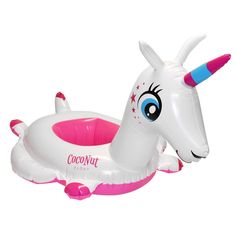 an inflatable unicorn float floating on top of it's back with its head sticking out