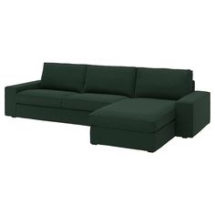 a dark green couch with a chaise lounge