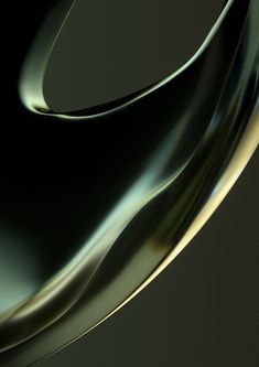 an abstract photograph of green and gold curves