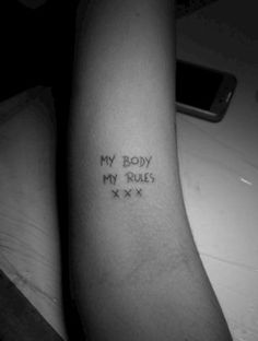 a person's arm with the words my body, my rules written on it