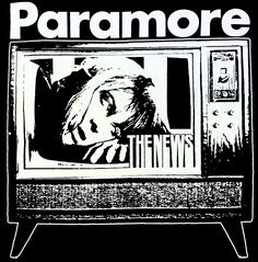 an old television with the words paramore on it in black and white, against a dark background