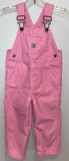 "Labeled 2T / color pink / measures side snap waist 11 1/2\" / inseam 12\" / length (shoulder straps fully extended to bottom leg) 30\" / Smoke free environment / no issues (90)" Light Pink Overalls, Pink Overall Jumpsuit With Pockets, Pink Cotton Overalls, Pink Cotton Shortalls With Pockets, Spring Pink Bib Front Overalls, Pink Cotton Bib Front Overalls, Pink Shortalls With Pockets, Overalls Aesthetic, Overalls Pink