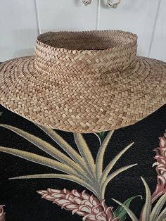 The Pāʻole or Pikoʻole is a crownless or piko-less hand woven lauhala pāpale (hat). Each pāʻole comes with an optional sew in sweatband, please specify with or without sweatband in the checkout notes. Woven in either Maka Moena or ʻOʻeno style (see description in choice) Handwoven by Native Hawaiian hands 100% Hawaiian lauhala (Pandanus) Adjustable High Crown Sun Hat For Vacation, Natural High Crown Straw Hat For Beach, Natural High Crown Straw Hat For Vacation, Adjustable High Crown Straw Hat In Natural Color, Adjustable High Crown Straw Hat For Beach, Natural Color Sun Hat One Size, Adjustable High Crown Sun Hat For Beach, Adjustable High Crown Sun Hat For The Beach, Adjustable High Crown Straw Hat