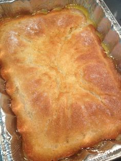 a baked pastry in a metal pan on a table