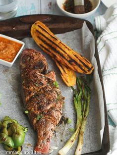 the meal is prepared and ready to be eaten on the tray, including asparagus